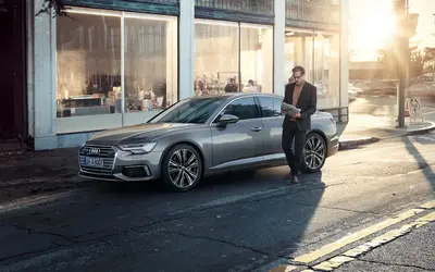Audi A6 side view parked on a street