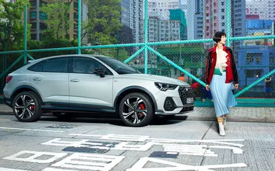 Audi Q3 Sportback front three-quarter view in an urban setting