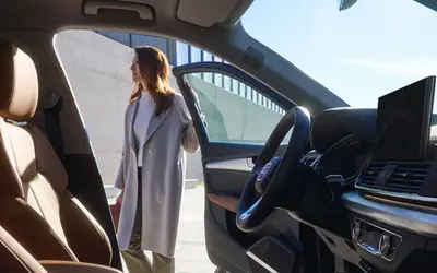 Audi Q5 front cabin seen through the open driver door