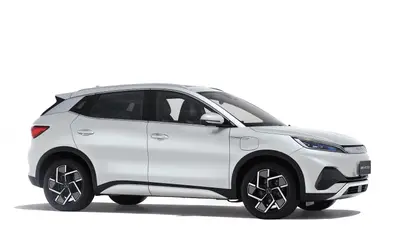 BYD Atto 3 front three-quarter studio view from the passenger side in white
