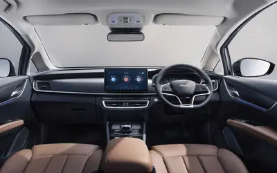 BYD eMAX 7 interior view of the dashboard, rotating touchscreen and front seats