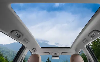 BYD eMAX 7 cabin viewed through the panoramic glass roof