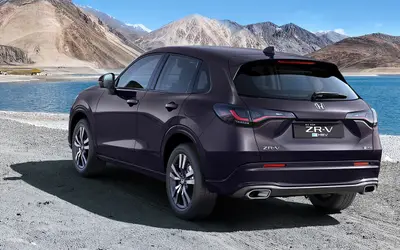 Honda ZR-V rear three-quarter view showing full-width LED tail lamps