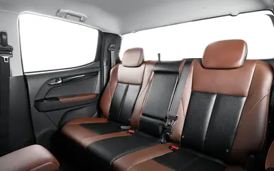 Isuzu D-Max V-Cross interior view of the rear bench seats in brown and black leather