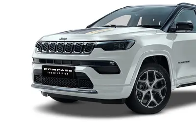 Jeep Compass Track Edition front three-quarter studio view in white