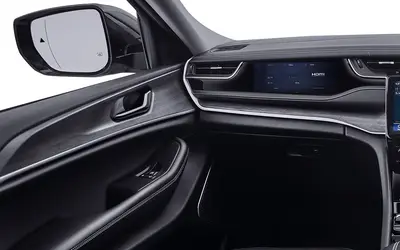 Jeep Grand Cherokee interior view of the dashboard, touchscreen and front cabin