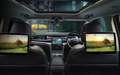 Jeep Grand Cherokee interior view of the rear-seat entertainment screens