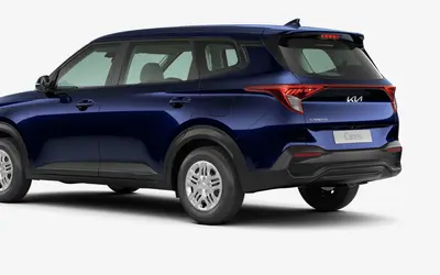 Kia Carens rear three-quarter view in Imperial Blue