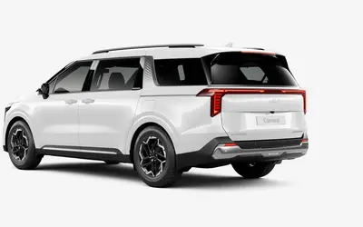 Kia Carnival rear three-quarter view in Glacier White Pearl