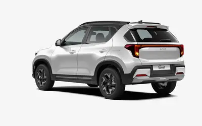 Kia Sonet rear three-quarter view in Glacier White Pearl with Aurora Black Pearl roof