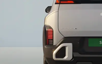 Kia Syros EV rear detail with Syros EV badging and vertical LED tail lamp