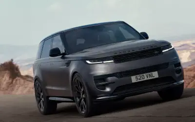 Range Rover Sport Stealth front three-quarter view on a mountain road