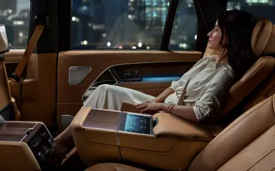 Range Rover rear cabin with reclining seats and the rear-seat entertainment screen