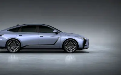 Lexus ES 500e side profile studio view in light blue