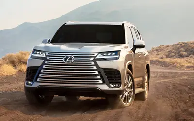 Lexus LX low-angle front view on a desert trail