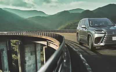 Lexus LX in motion on a mountain viaduct