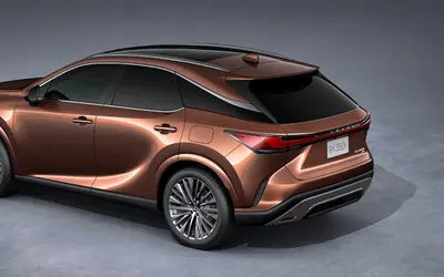 Lexus RX rear three-quarter studio view in copper