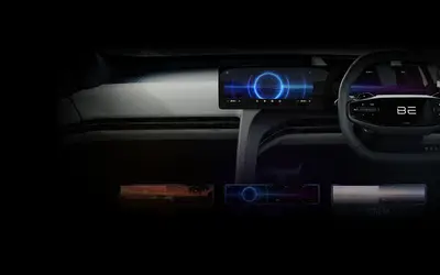 Mahindra BE 6 cockpit-style dashboard with twin screens and BE steering wheel