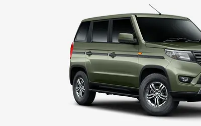 Mahindra Bolero Neo front three-quarter view in Rocky Beige