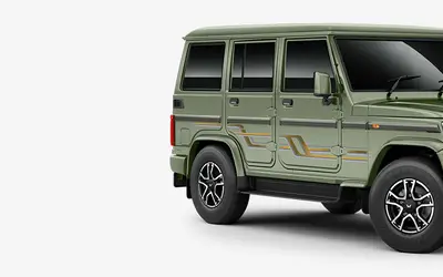 Mahindra Bolero front three-quarter view in Rocky Beige
