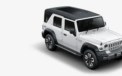 Mahindra Thar Roxx front three-quarter view in Everest White