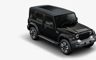 Mahindra Thar Roxx front three-quarter view in Stealth Black