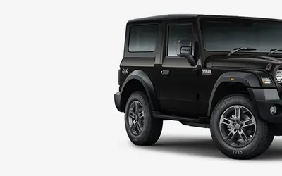 Mahindra Thar front three-quarter view in Stealth Black