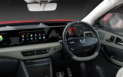 Mahindra XEV 9e dashboard and steering wheel with light upholstery