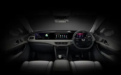 Mahindra XEV 9S dashboard with triple-screen cockpit layout