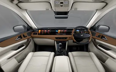 Mahindra XUV 7XO dashboard with triple screens and two-tone cabin