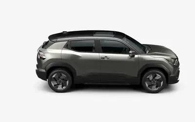 Maruti e Vitara side profile in ⁠Land Breeze Green with Bluish Black Roof