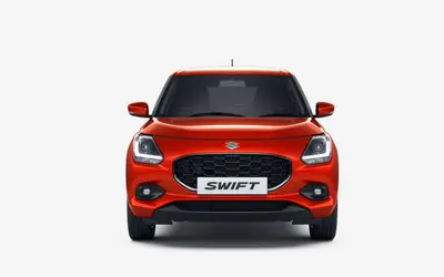 Maruti Swift front view in Novel Orange