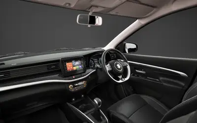 Maruti XL6 dashboard and front cabin with all-black interior