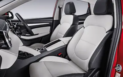 MG ZS EV front seats and dashboard with dual-tone black and ivory upholstery