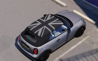 MINI Cooper Convertible with the Union Jack soft top closed, seen from above and behind