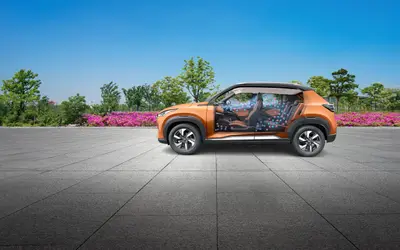 Nissan Magnite side profile in orange