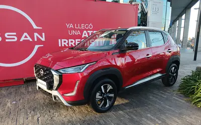 Nissan Magnite front three-quarter view in red