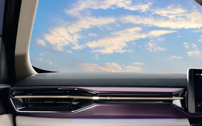 Nissan Tekton dashboard passenger side with mood lighting and purple-gold trim