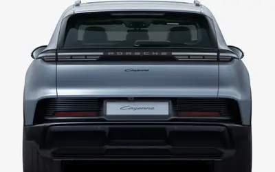 Porsche Cayenne Electric rear studio view in silver, showing the light bar and Cayenne lettering