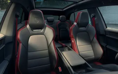 Porsche Cayenne Electric front sports seats in black with red contrast detailing