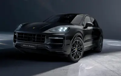 Porsche Cayenne Black Edition front three-quarter studio view in black