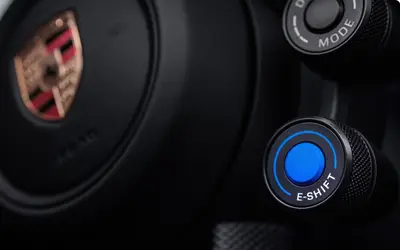 Porsche Taycan steering wheel hub with the drive mode dial
