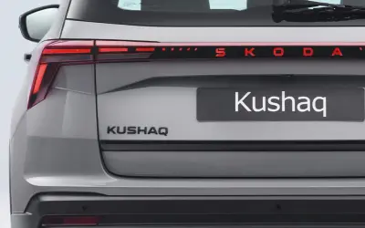 Skoda Kushaq rear view with connected LED taillights and illuminated Skoda lettering