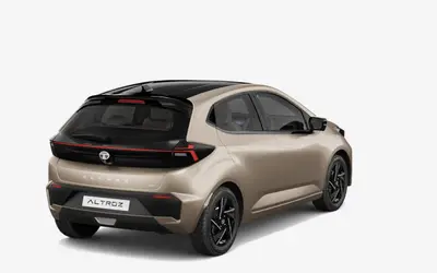 Tata Altroz rear three-quarter view from the opposite side in Dune Glow