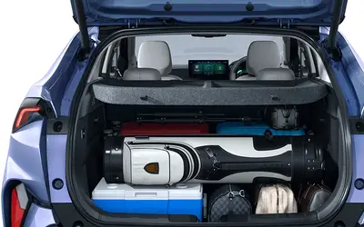 Tata Curvv EV boot space with luggage loaded and tailgate open