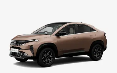 Tata Curvv rear three-quarter view in Gold Essence