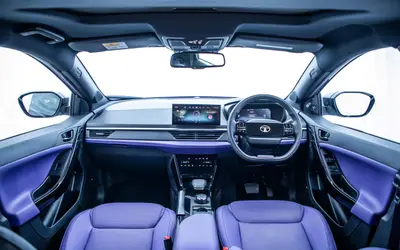 Tata Nexon facelift dashboard and front cabin in the Fearless Purple theme