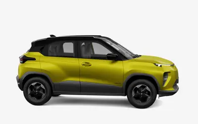 Tata Punch EV front three-quarter view from the passenger side in Fearless Yellow