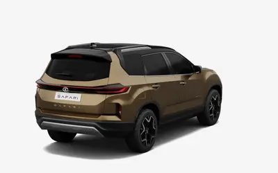 Tata Safari rear three-quarter view in Cosmic Gold