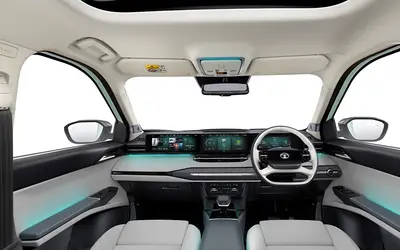 Tata Sierra EV dashboard with triple-screen layout and panoramic roof